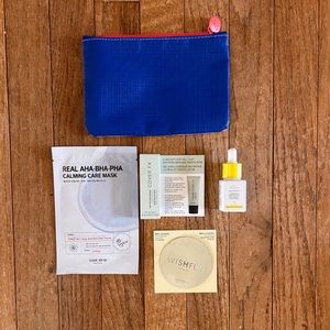 Makeup Ipsy blue and white bag with samples